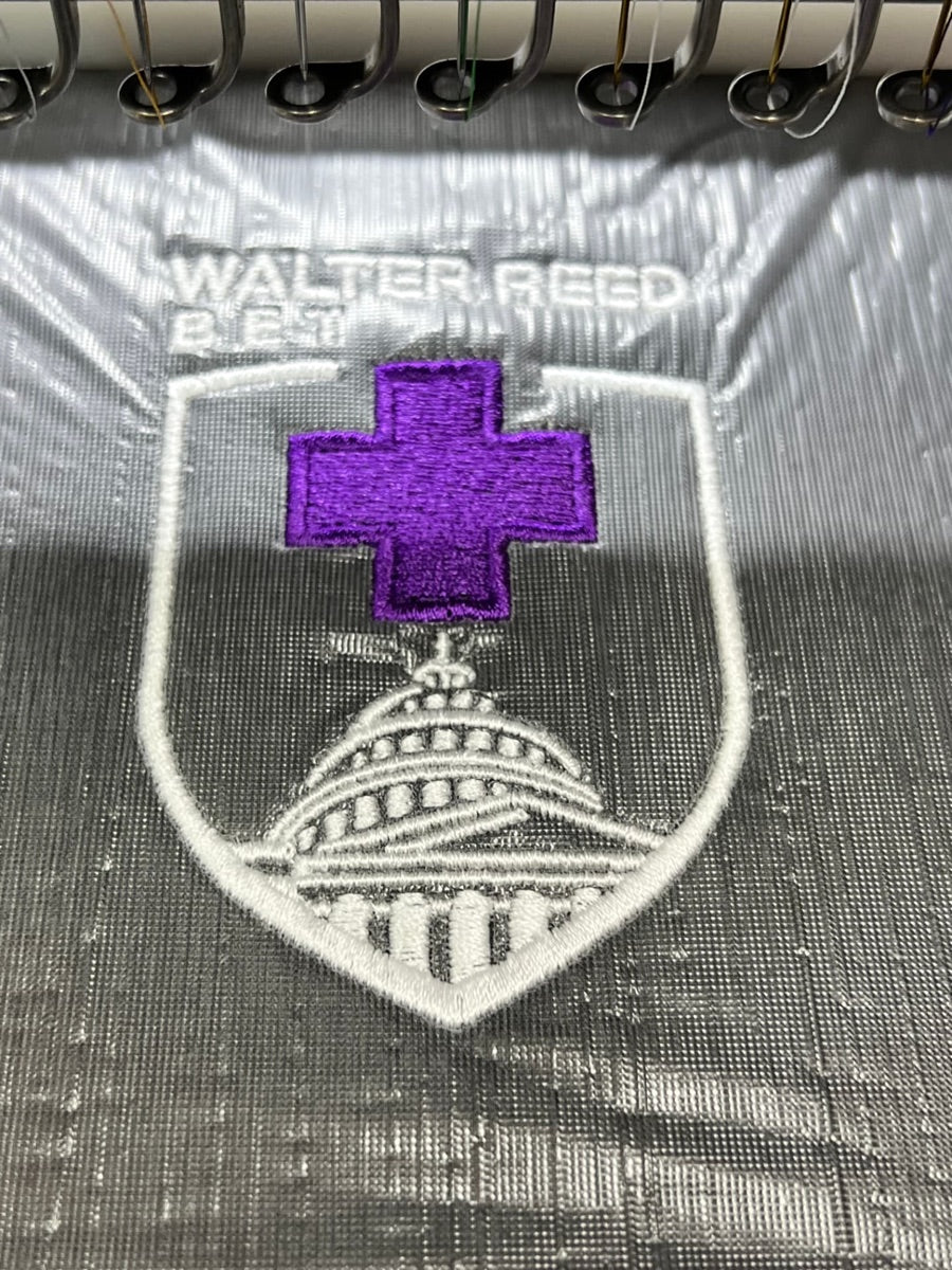 White Shield — Purple Cross
