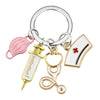 Medical Charm Keychain, Nurse Cap & Stethoscope in Pink, face mask charm on a split ring, front view