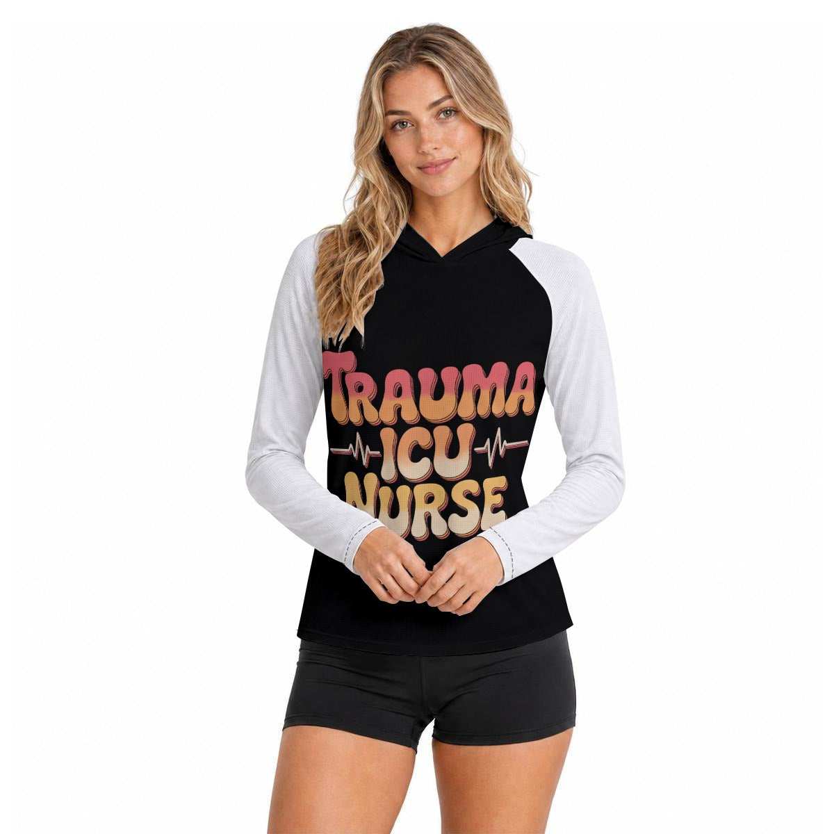 Trauma ICU Nurse hooded sun shirt, front view: TRAUMA ICU NURSE in thick retro lettering with a heartbeat line across the chest, contrast raglan sleeves, worn on a plain backdrop
