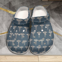 Medical Caduceus Men's Classic Clogs seen from above as a pair, the caduceus pattern across both vamps and the ventilation holes punched through it