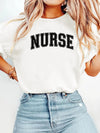 Nurse Collegiate Arch T-Shirt in White, NURSE in a collegiate arch across the chest, worn with jeans