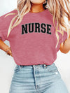 Nurse Collegiate Arch T-Shirt in Dark Red, NURSE in a collegiate arch across the chest, worn with jeans