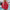 Registered Nurse Hearts Pullover Sweatshirt in Red, front view on a model by a pool