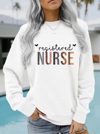 Registered Nurse Hearts Pullover Sweatshirt in White, front view on a model by a pool
