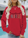 Registered Nurse Hearts Pullover Sweatshirt in Red, front view on a model by a pool