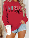 Nurse Life Pastel Letters Sweatshirt in Red, front view on a model holding a coffee cup