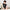 Doctor in Training D.O. baby one-piece bodysuit in black, front view