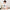 Doctor in Training M.D. baby one-piece bodysuit in white, front view
