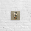 Nurse of Many Layers canvas print, 10×10 inch, hung on a painted brick wall