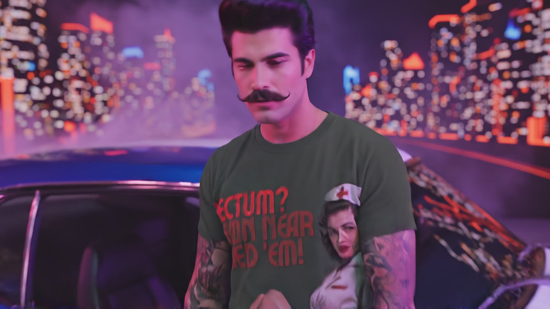 Rectum? Damn Near Killed 'Em! Men's Athletic T-shirt video: a tattooed model in the charcoal tee at night in front of a neon city skyline and a classic car
