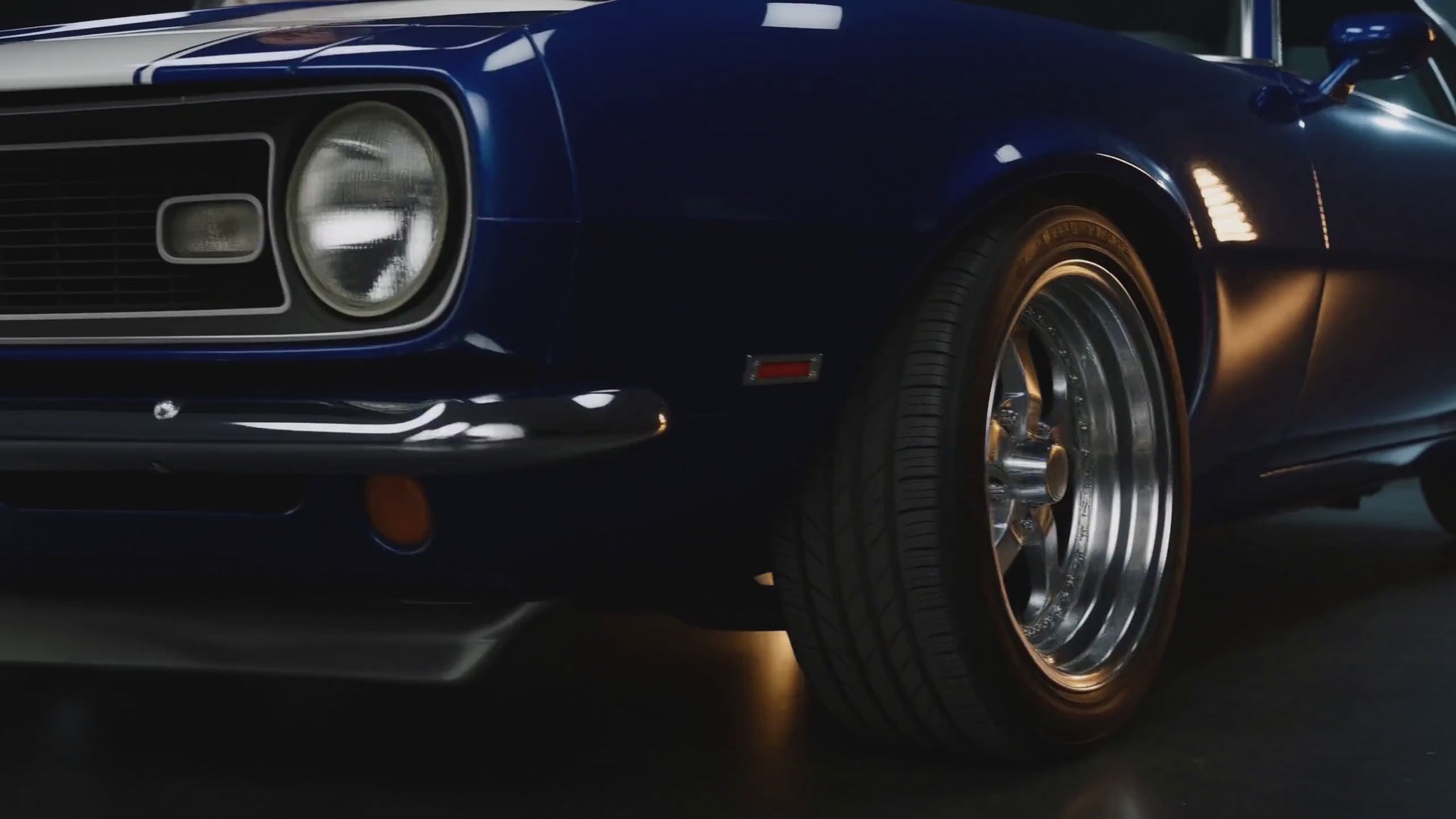 Rectum? Damn Near Killed 'Em! Men's Athletic T-shirt video: a tattooed model poses beside a blue-striped classic muscle car, with close-ups of the pin-up print