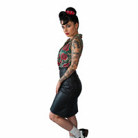 Model wearing the Medical Caduceus scrunchie in a styled updo, side view