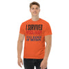 I Survived Physical Therapy, Full Range of Motion unisex t-shirt in orange, front view on model
