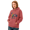 NURSE in glossy multicoloured paint-splash letters on a Crimson garment-dyed unisex hoodie