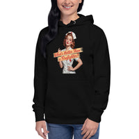What's Hotter Than a Firefighter? unisex hoodie in Black, worn by a model, front view of the 1950s pin-up nurse standing behind a two-line script banner
