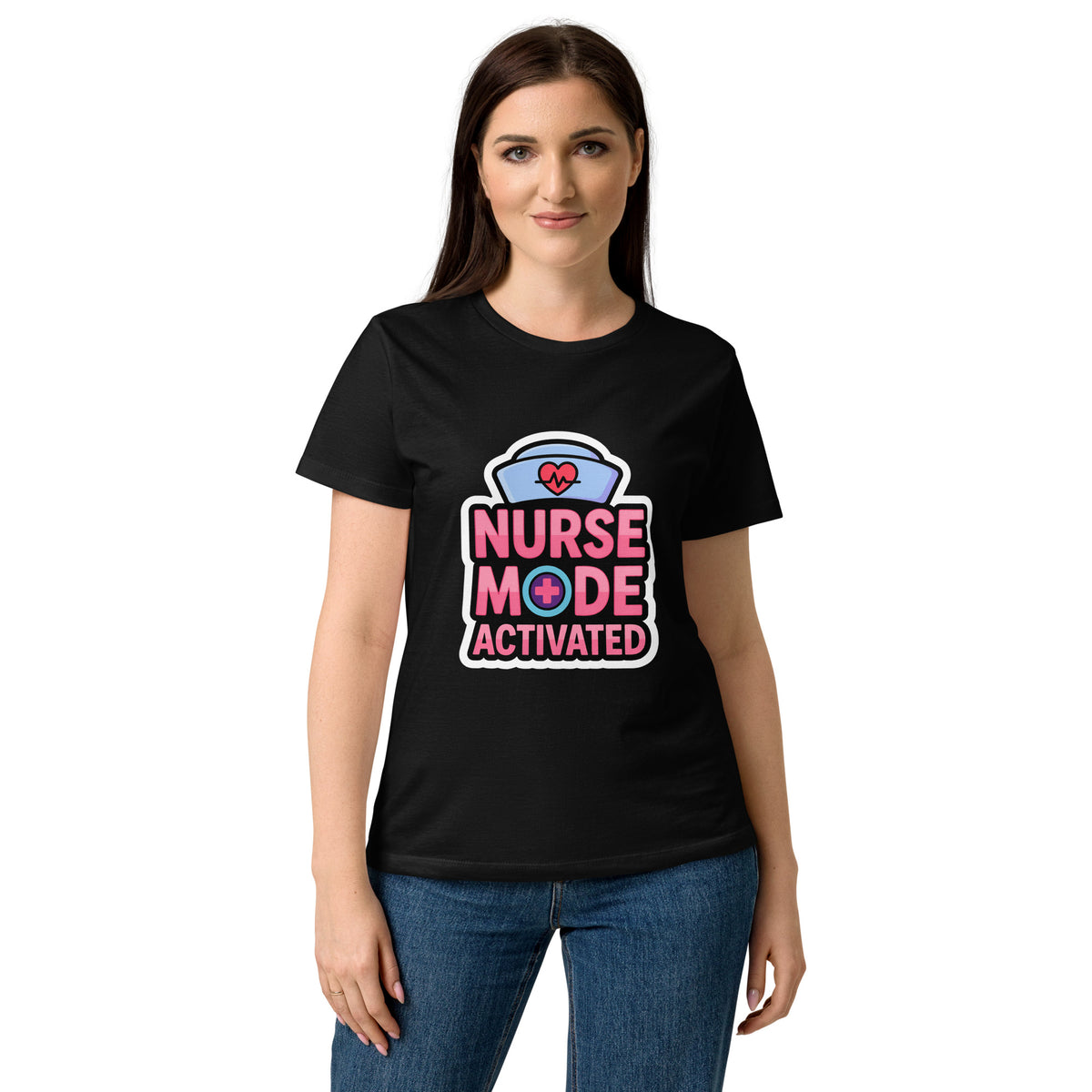Nurse Mode Activated women's softstyle t-shirt in black — worn by a model, front view of the nurse-cap badge reading NURSE MODE ACTIVATED