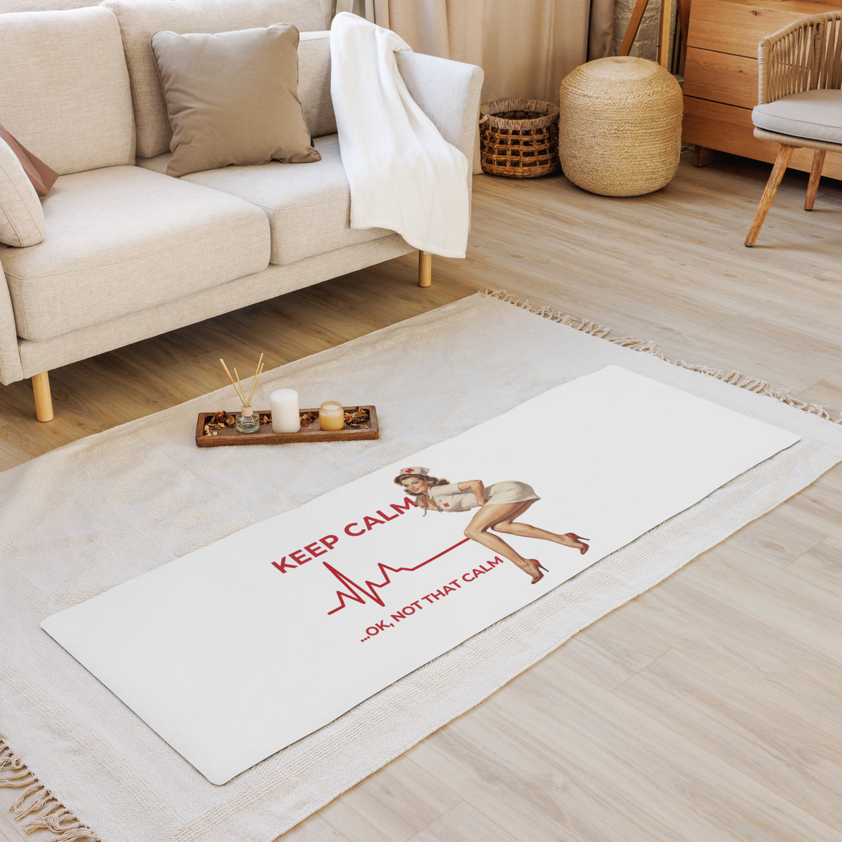 Keep Calm… OK, Not That Calm Yoga Mat unrolled on a living-room floor beside a sofa, EKG line and pin-up nurse along the mat